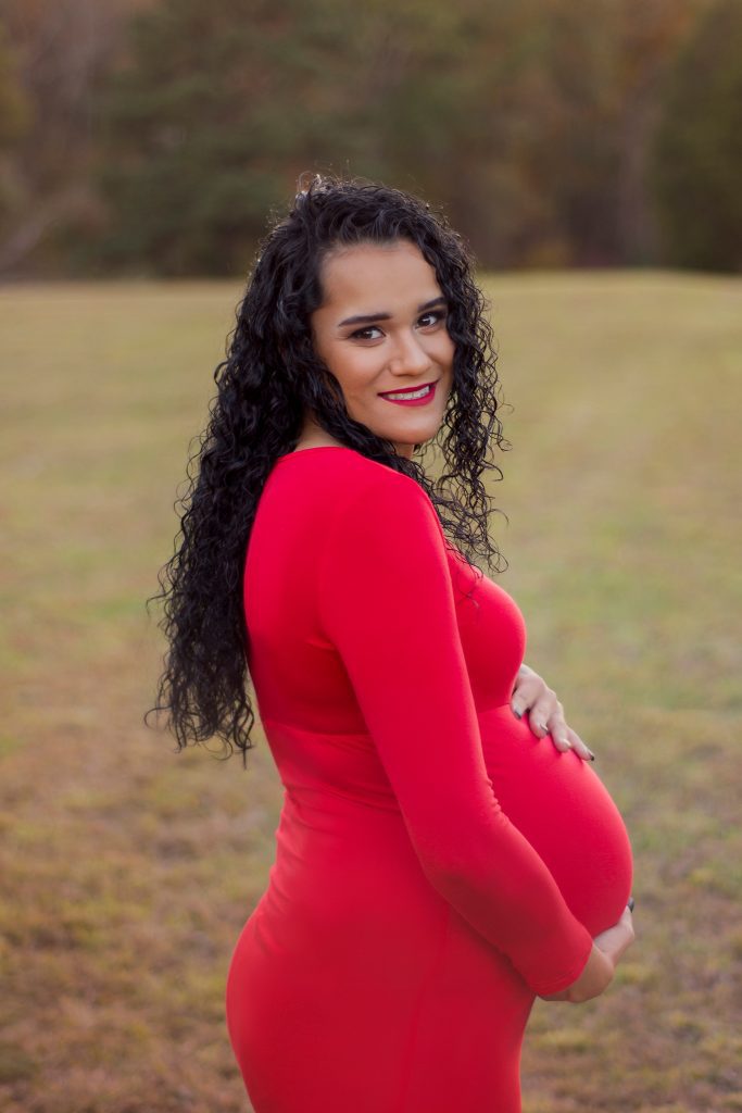 Maternity session with red dress gown in Clarksville, TN