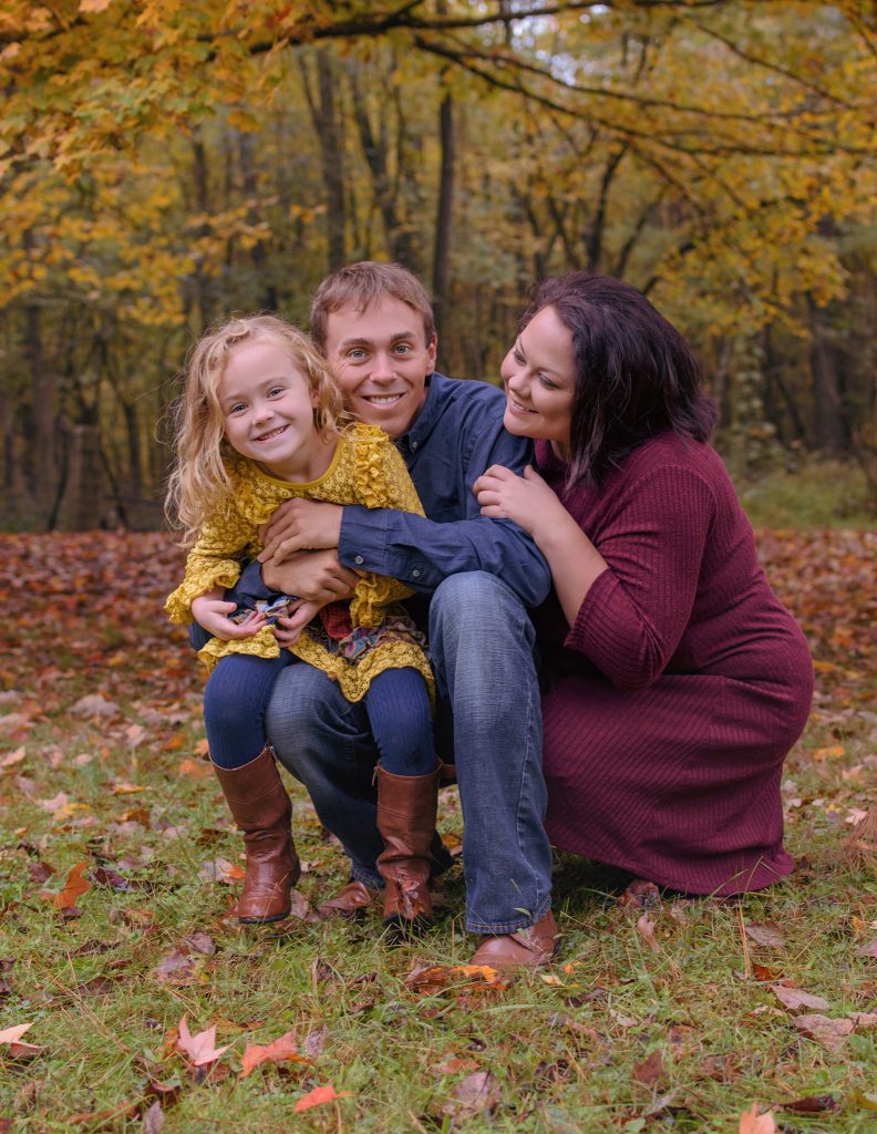 Clarksville Family Photographer with a family of 3 during the fall