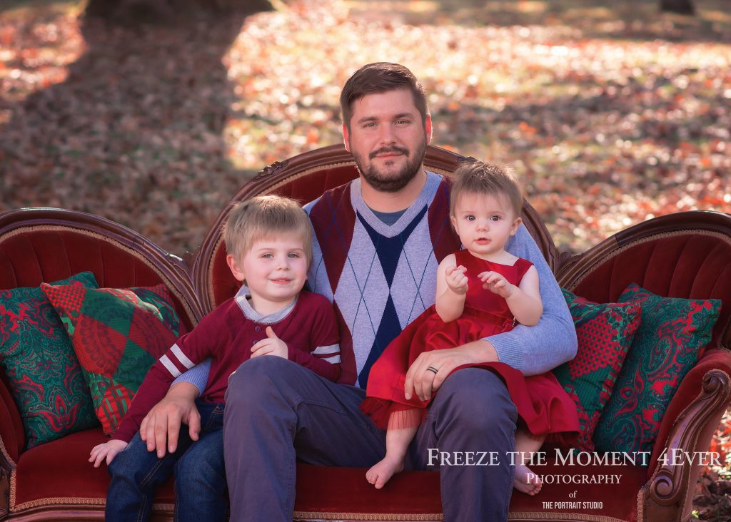 family photo christmas dad with two kids holiday photo session victorian vintage style couch