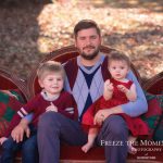 family photo christmas dad with two kids holiday photo session victorian vintage style couch