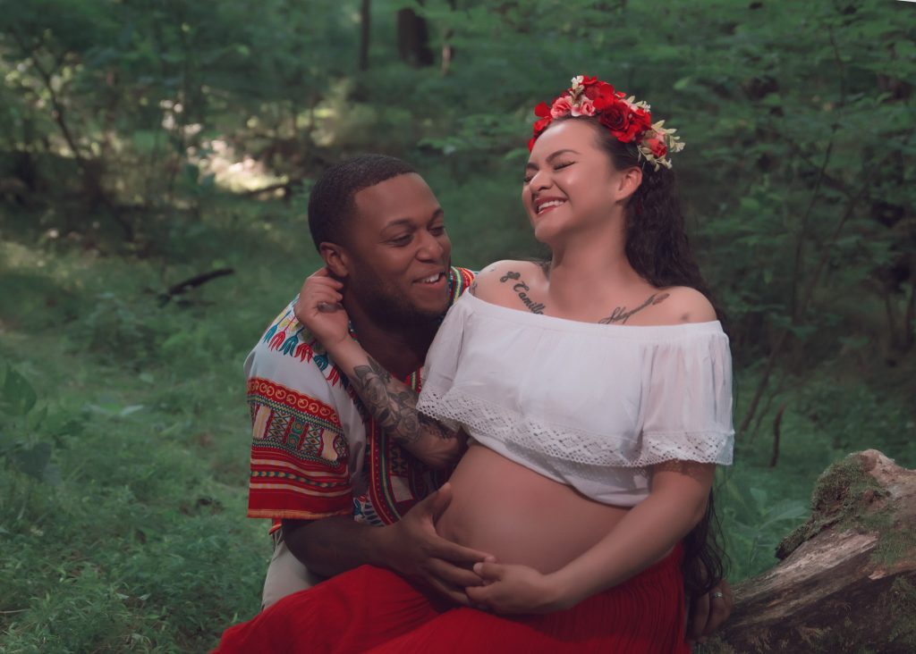 Mexican-themed Cultural Tribal Maternity dress shoot in Clarksville Tennessee TN husband and wife laughing