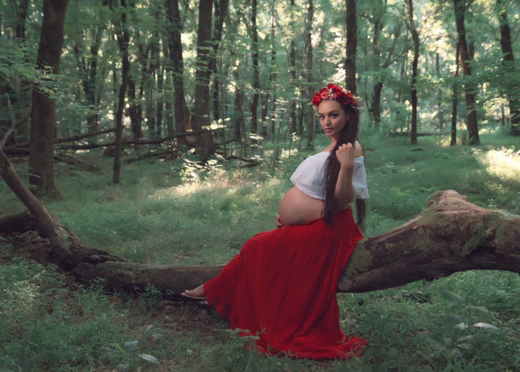Mexican-themed Cultural Tribal Maternity dress shoot in Clarksville Tennessee TN red dress in the woods trees