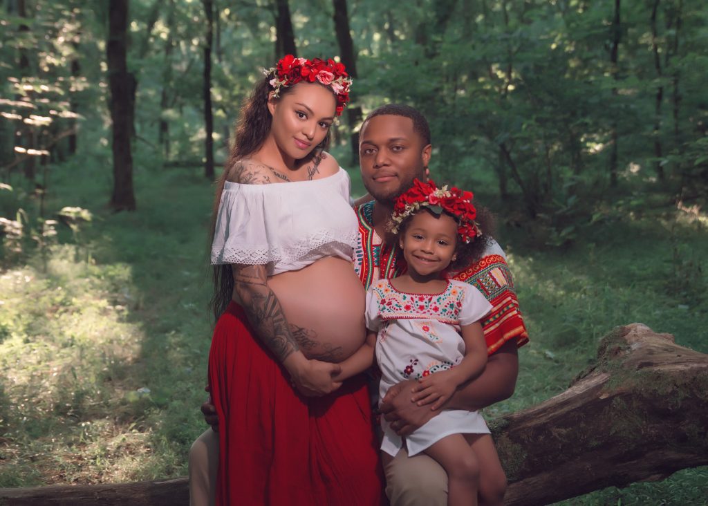 Mexican-themed Cultural Tribal Maternity dress shoot in Clarksville Tennessee TN red dress in the woods trees family of 3 three photo