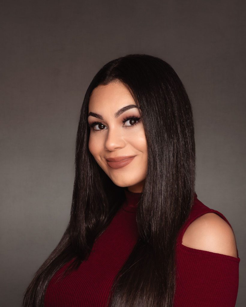 Female with long dark hair for a business portrait photo