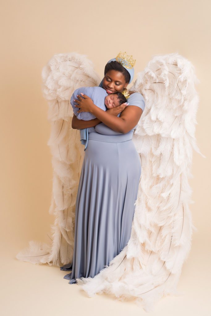 Newborn studio session with mother and son in wing in Clarksville Tennessee TN