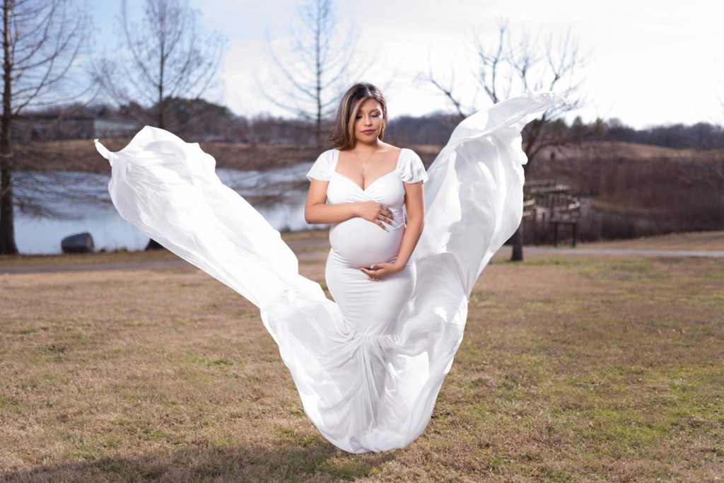 White maternity dress tossed outside