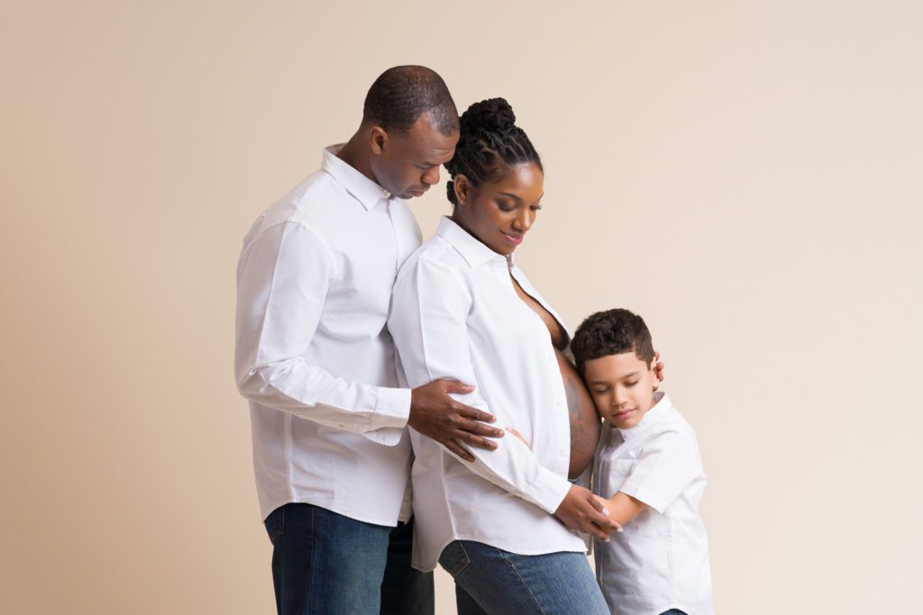 Family of 3 maternity studio session with white shirt